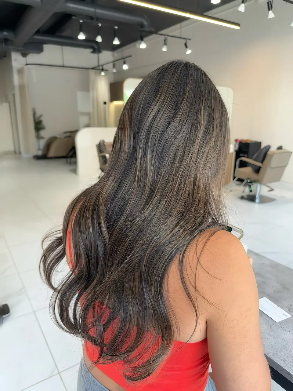 Dark brown hair with fine babylights