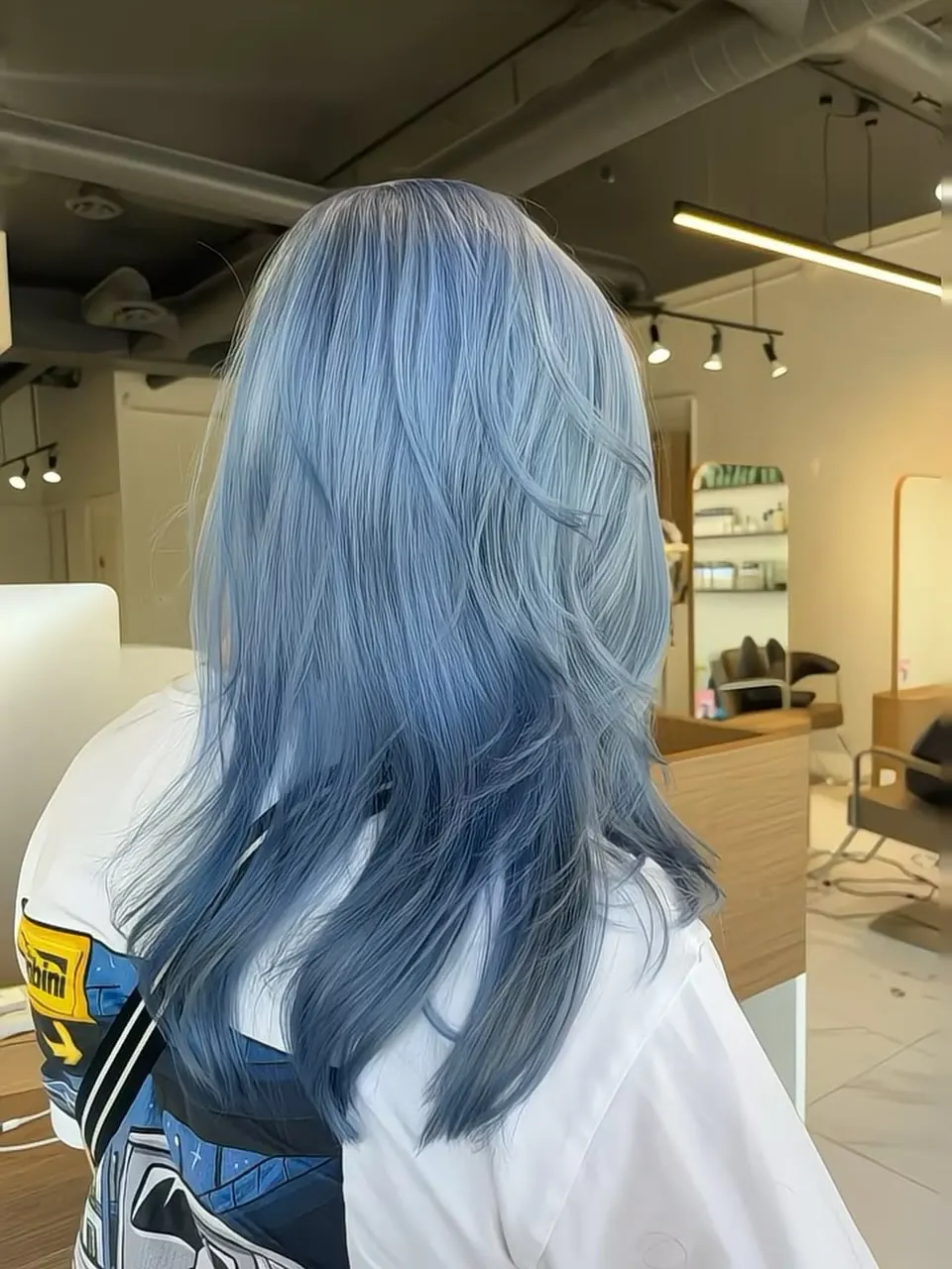 Pastel denim blue layered hair