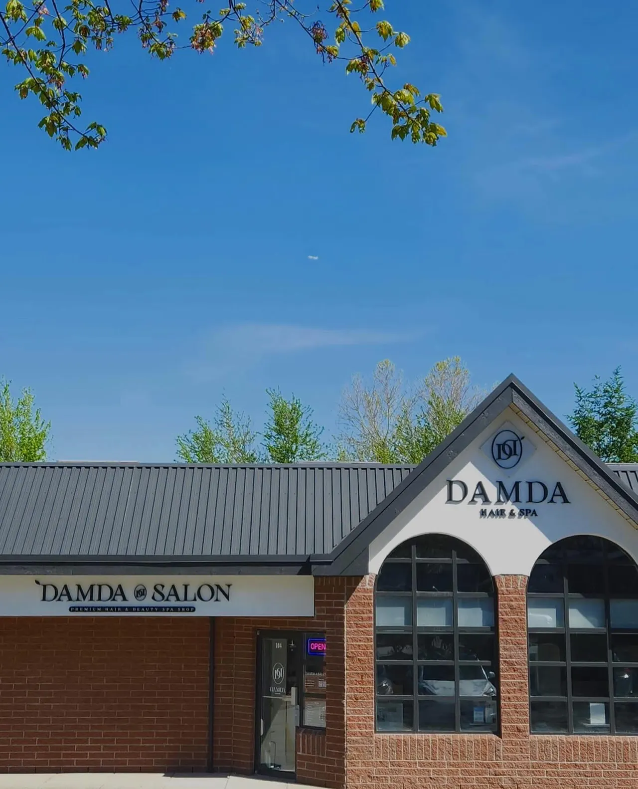 Salon de Damda storefront with arched windows in Langley